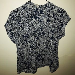 White and blue floral blouse